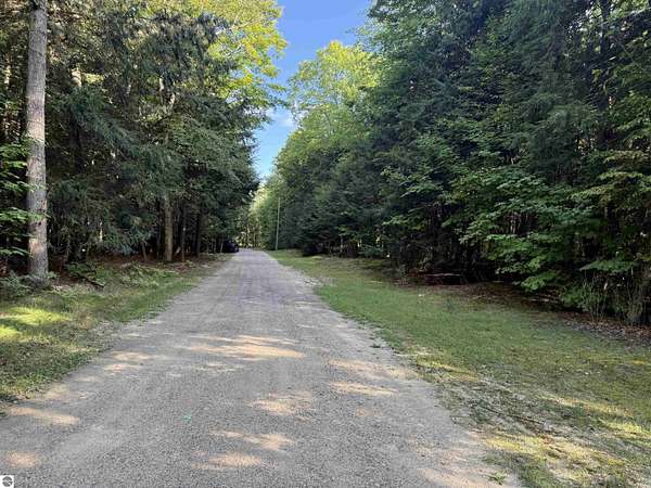 1.14 Acres of Residential Land for Sale in Kewadin, Michigan