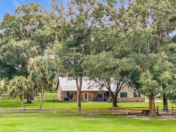 9.18 Acres of Land with Home for Sale in Chiefland, Florida