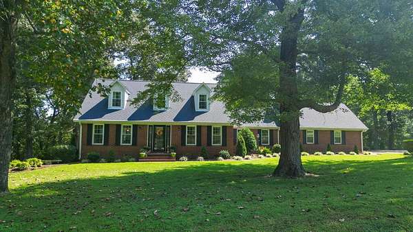 5 Acres of Land with Home for Sale in Paris, Tennessee