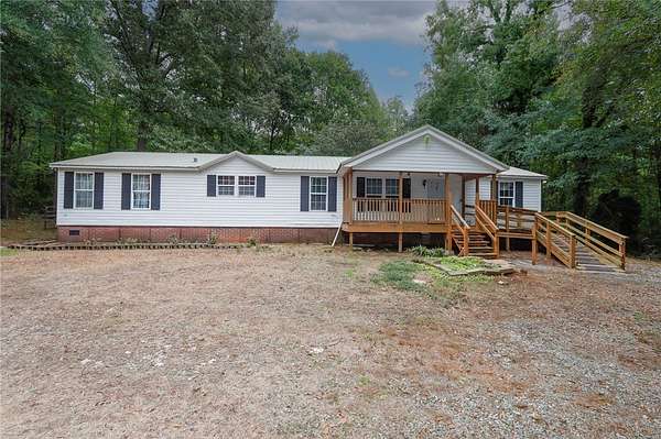 5.33 Acres of Land with Home for Sale in Liberty, South Carolina