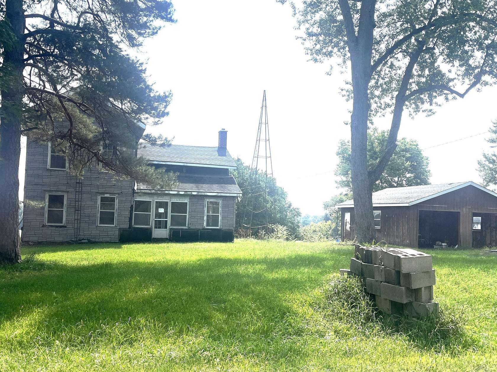 2 Acres of Land with Home for Sale in Rives Junction, Michigan