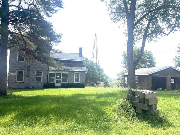 2 Acres of Land with Home for Sale in Rives Junction, Michigan