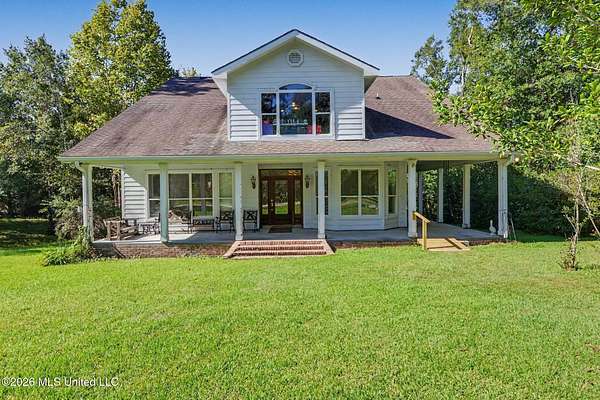 5.6 Acres of Land with Home for Sale in Kiln, Mississippi