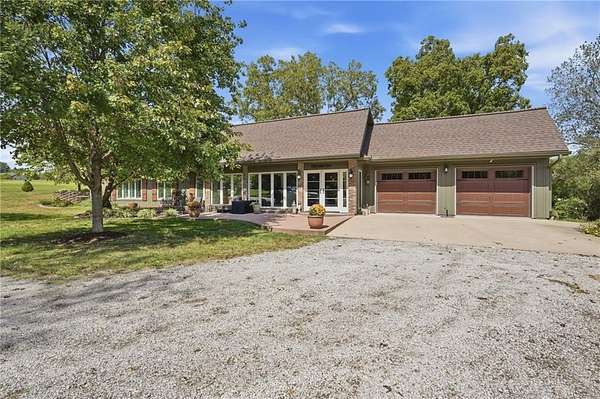 5.15 Acres of Land with Home for Sale in Peculiar, Missouri