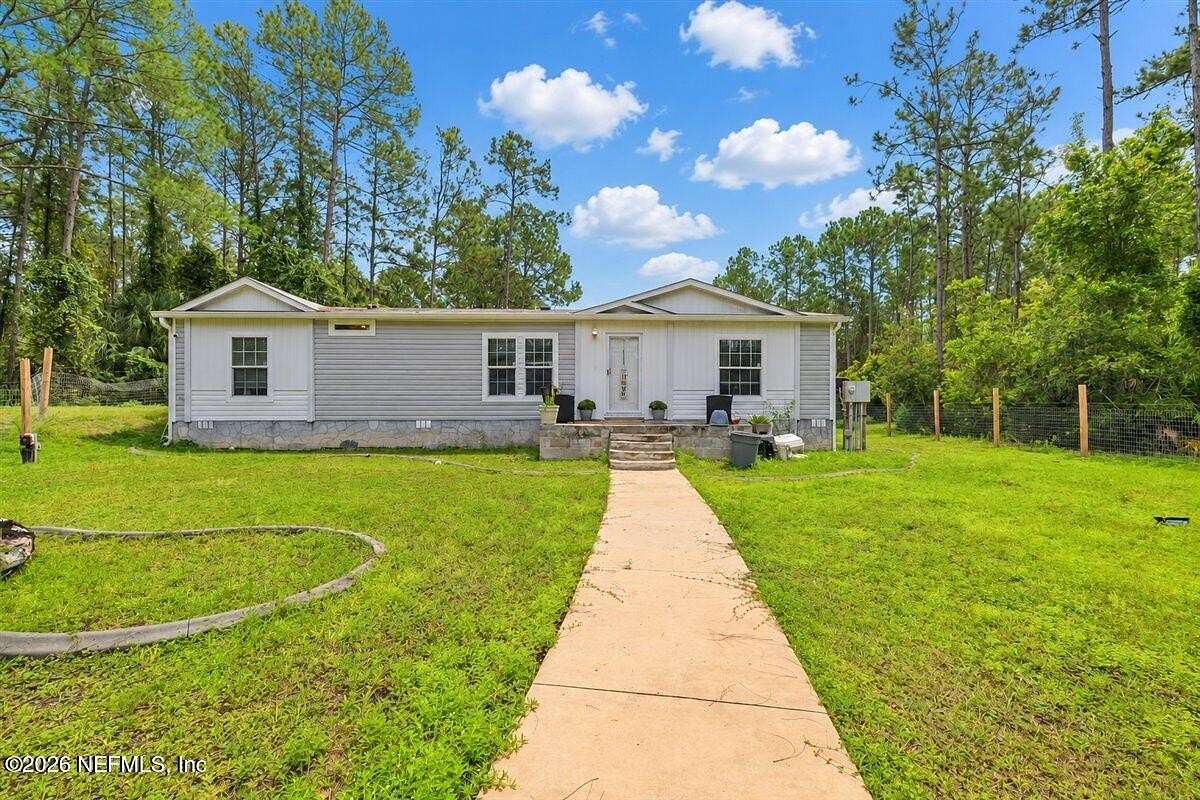 10.1 Acres of Land with Home for Sale in Interlachen, Florida