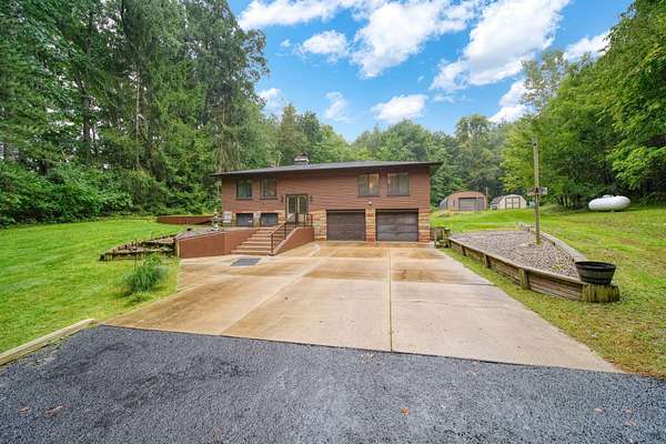 10 Acres of Recreational Land with Home for Sale in Parma, Michigan