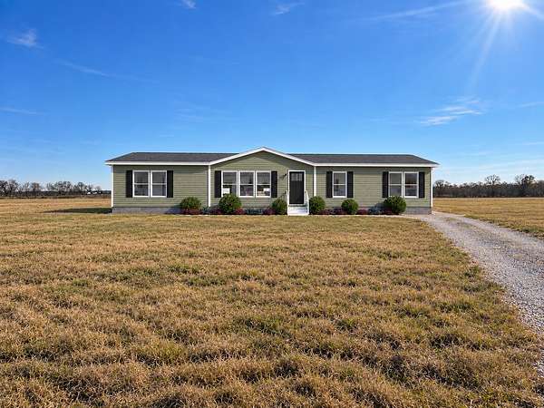 3 Acres of Land with Home for Sale in Pattonville, Texas