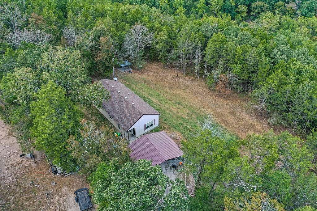 4.1 Acres of Land with Home for Sale in Kissee Mills, Missouri