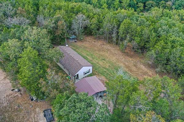 4.1 Acres of Land with Home for Sale in Kissee Mills, Missouri