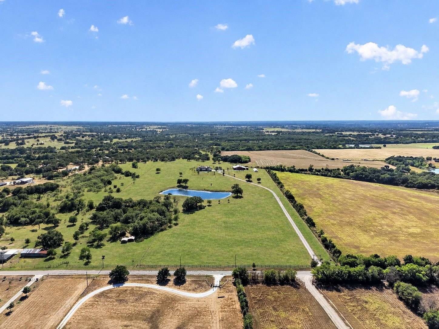 41.7 Acres of Agricultural Land with Home for Sale in Grandview, Texas