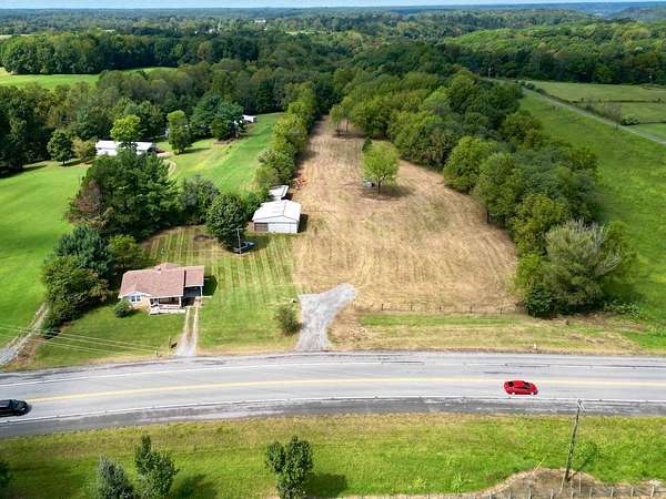 10.7 Acres of Land with Home for Auction in Dunnville, Kentucky