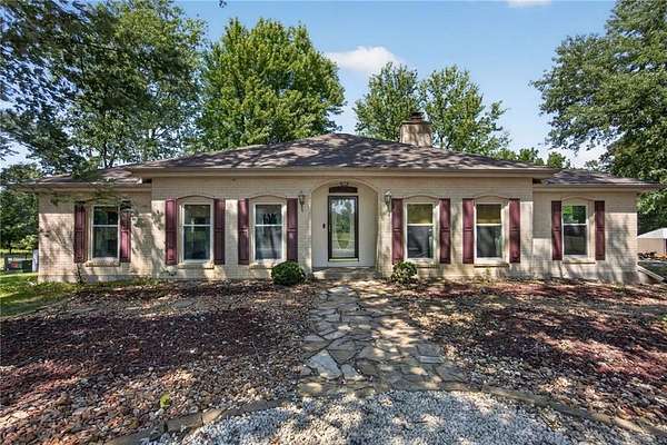 5.1 Acres of Land with Home for Sale in Peculiar, Missouri