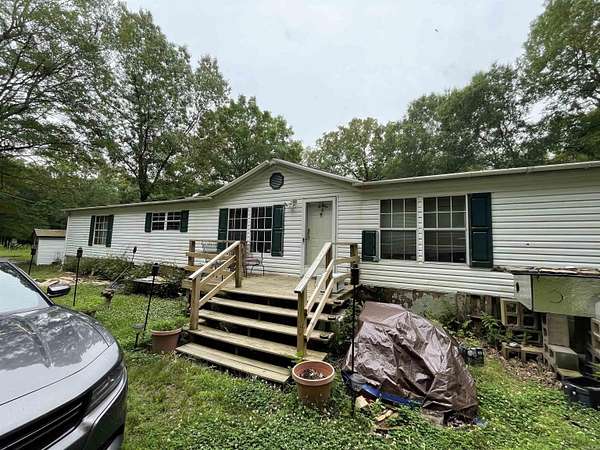 10.5 Acres of Land with Home for Sale in Mayflower, Arkansas