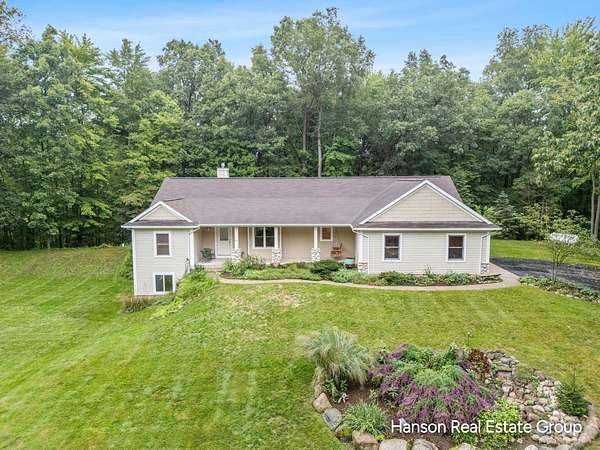 5 Acres of Land with Home for Sale in Ada, Michigan