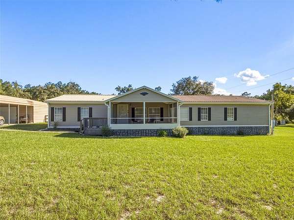 2.56 Acres of Land with Home for Sale in Dunnellon, Florida
