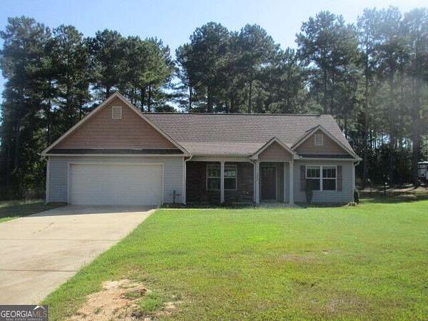 1.74 Acres of Land with Home for Sale in Barnesville, Georgia