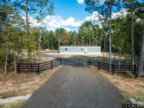 4 Acres of Land with Home for Sale in Naples, Texas