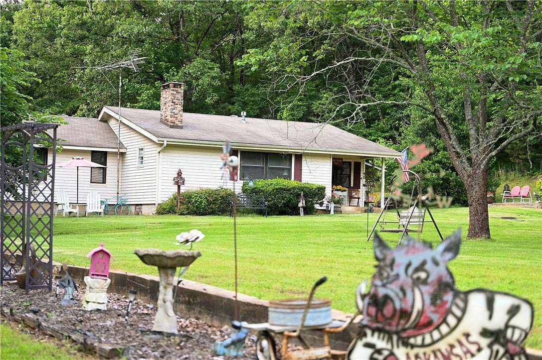 6 Acres of Land with Home for Sale in Clarksville, Arkansas