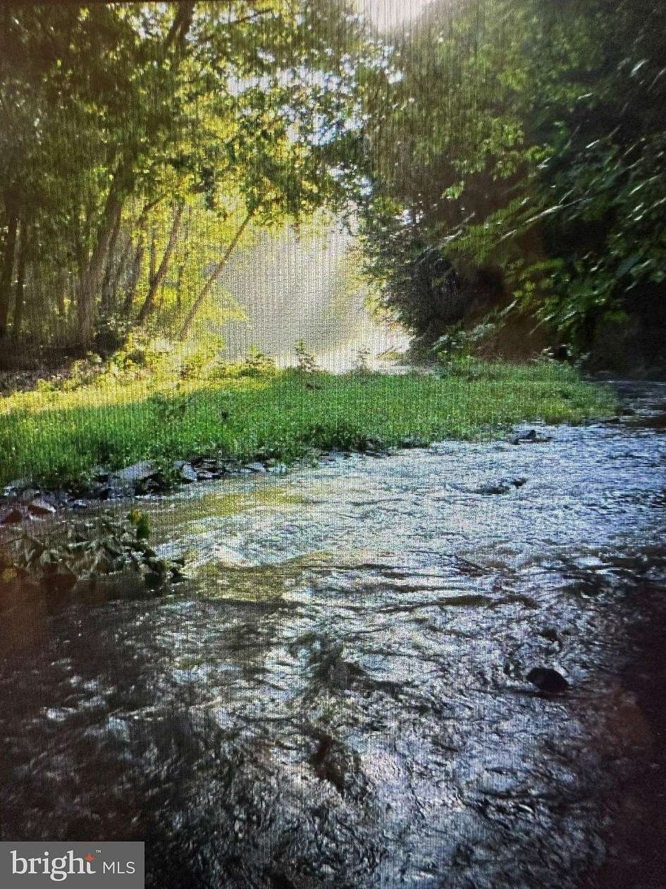 1.5 Acres of Land with Home for Sale in Capon Bridge, West Virginia