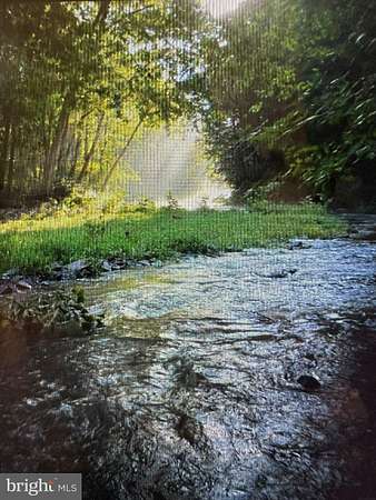 1.5 Acres of Land with Home for Sale in Capon Bridge, West Virginia