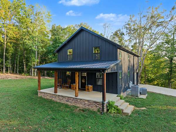 10.6 Acres of Land with Home for Sale in Lafayette, Tennessee