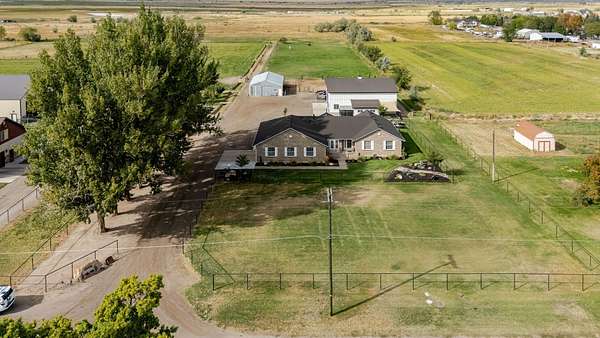 10.8 Acres of Land with Home for Sale in Hooper, Utah
