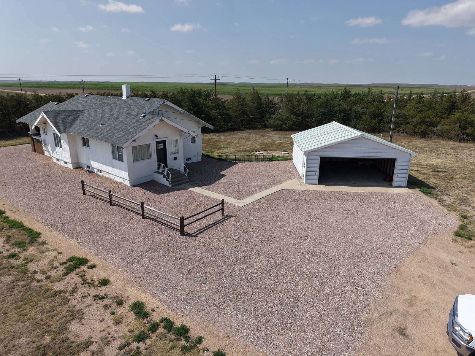 8 Acres of Land with Home for Auction in Potter, Nebraska