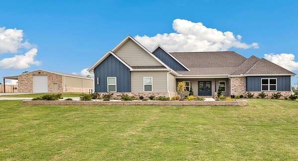 5.34 Acres of Land with Home for Sale in Farmington, Arkansas