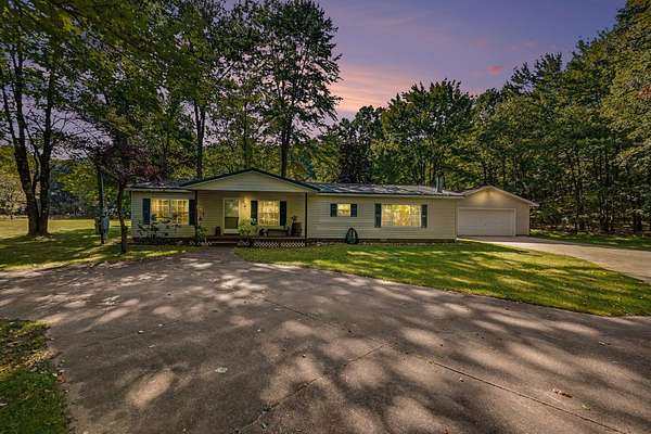 9 Acres of Land with Home for Sale in Irons, Michigan