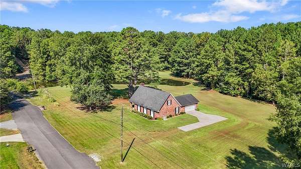 6.5 Acres of Land with Home for Sale in Coker, Alabama