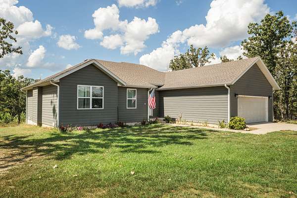 7.84 Acres of Land with Home for Sale in Seymour, Missouri