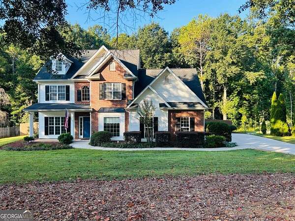 1.68 Acres of Land with Home for Lease in Sharpsburg, Georgia