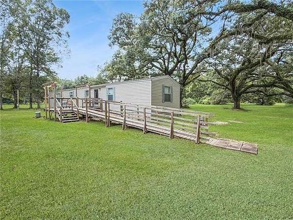 5.75 Acres of Land with Home for Sale in Pearl River, Louisiana