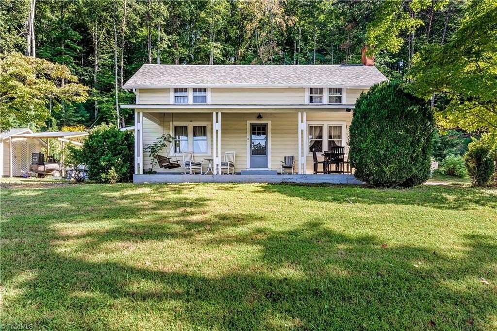 5.12 Acres of Land with Home for Sale in Lowgap, North Carolina
