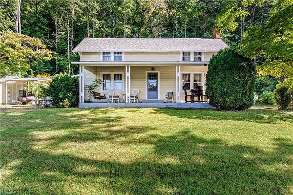 5.12 Acres of Land with Home for Sale in Lowgap, North Carolina