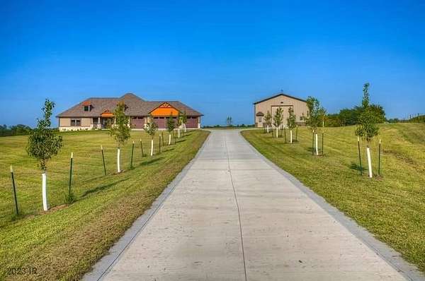 17.6 Acres of Land with Home for Sale in Earlham, Iowa
