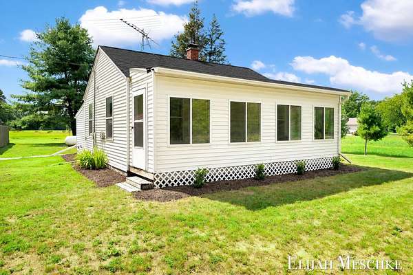 2 Acres of Land with Home for Sale in Nunica, Michigan