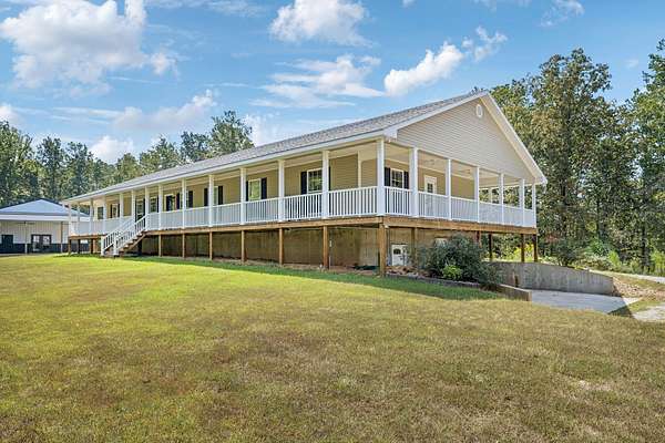 9.49 Acres of Land with Home for Sale in Hohenwald, Tennessee