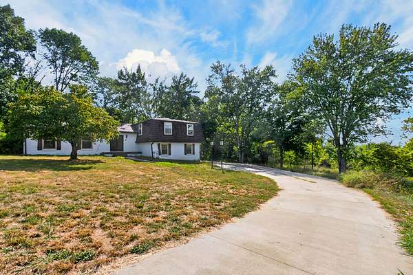 7.13 Acres of Land with Home for Sale in Lebanon, Tennessee