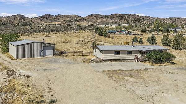 1.52 Acres of Land with Home for Sale in Spring Creek, Nevada