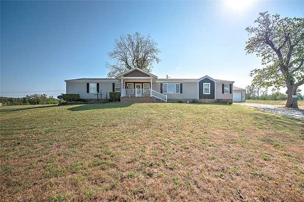 3.26 Acres of Land with Home for Sale in Siloam Springs, Arkansas