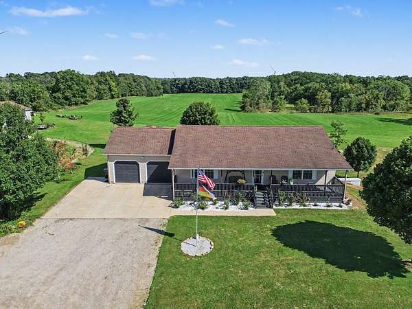 40 Acres of Land with Home for Sale in North Adams, Michigan