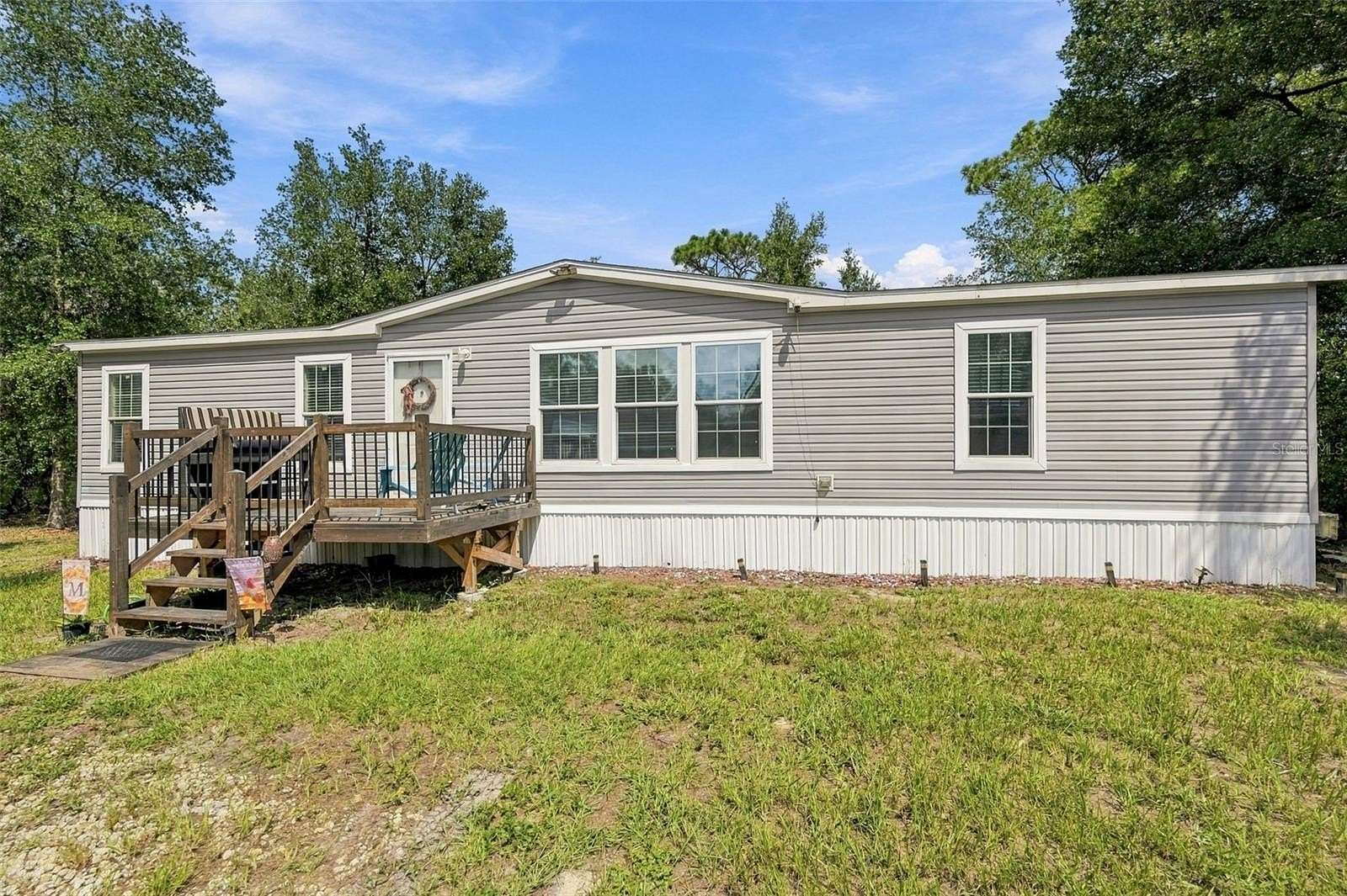 1.63 Acres of Land with Home for Sale in Spring Hill, Florida