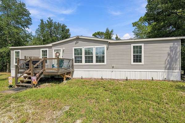 1.63 Acres of Land with Home for Sale in Spring Hill, Florida