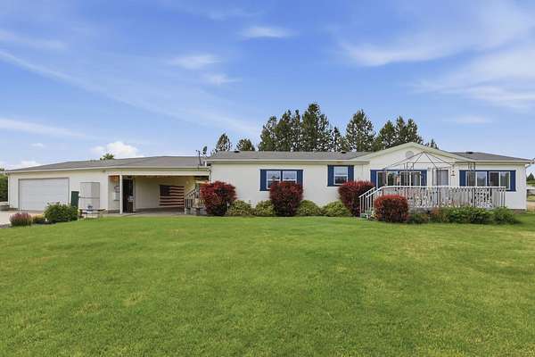 6.23 Acres of Land with Home for Sale in Deer Park, Washington