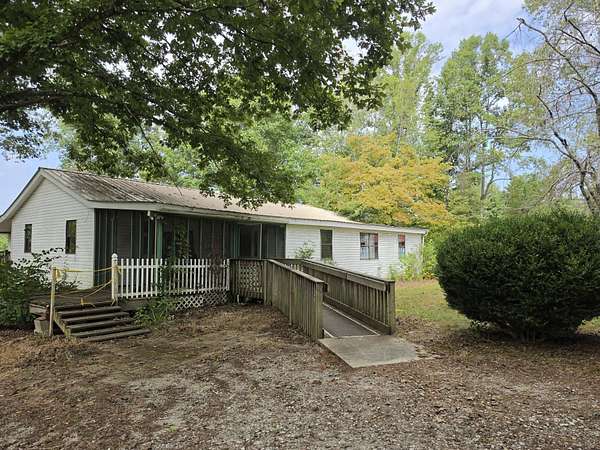 10.7 Acres of Land with Home for Sale in Pikeville, Tennessee