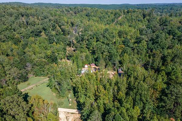 45.8 Acres of Recreational Land with Home for Sale in Lobelville, Tennessee