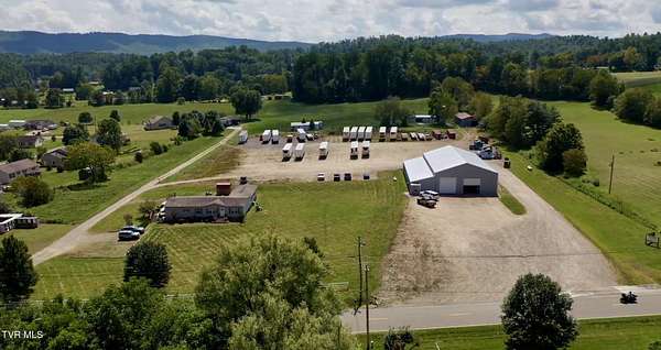 11.2 Acres of Land with Home for Sale in Mountain City, Tennessee