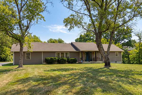 1.8 Acres of Land with Home for Auction in Carthage, Tennessee