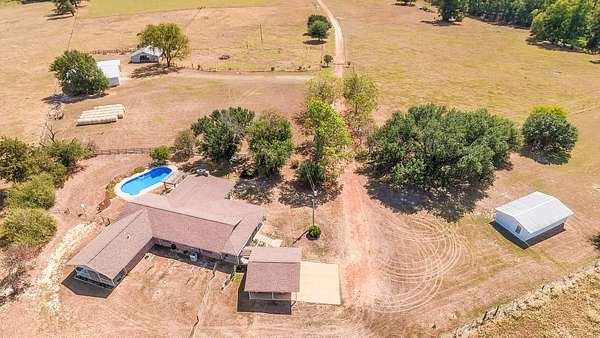 70.5 Acres of Land with Home for Sale in Pittsburg, Texas